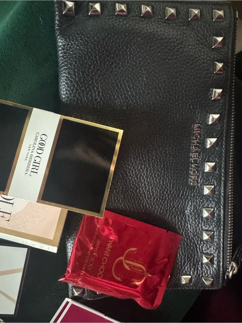 Micheal Kors Wristlet stuffed with minis